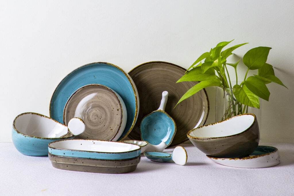 Crockery set in Blue and Grey colour with bowls, side plates, and dinner plates